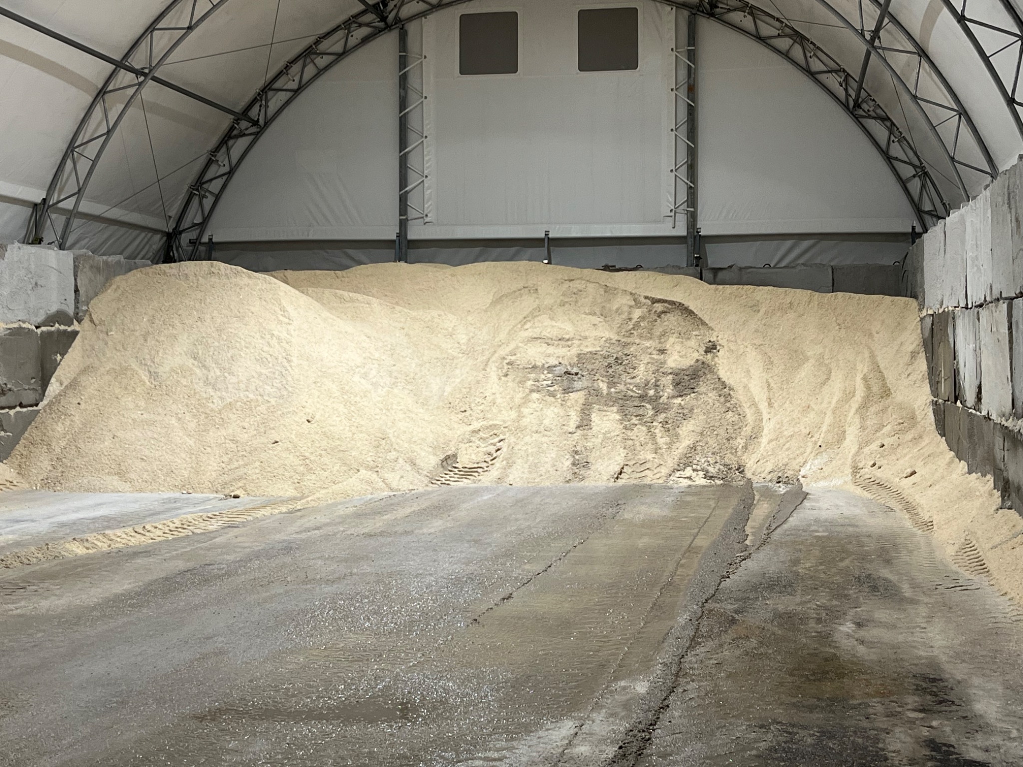 Bulk road salt stored inside a covered dome